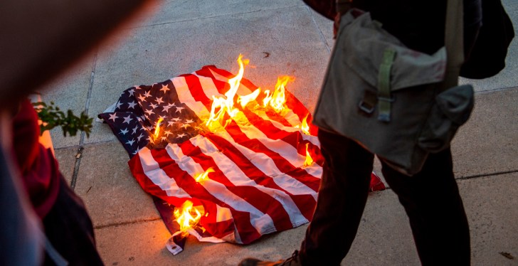 Woman Sheds Pants, Gets Arrested For Burning Stolen American Flags
