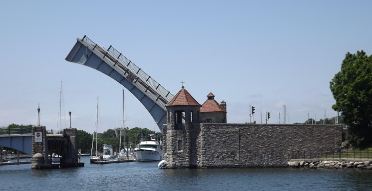 Woman Hangs On For Dear Life From Rising Drawbridge